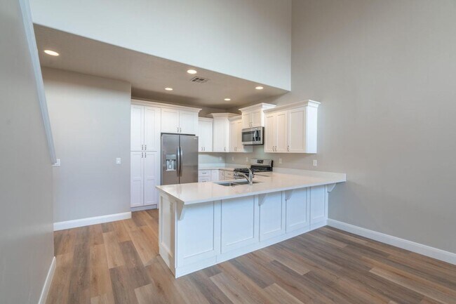 Building Photo - BRAND NEW HURRICANE TOWNHOME - END UNIT