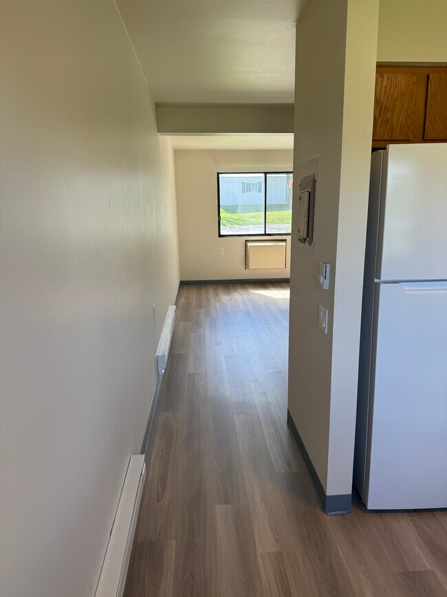 Cocina integrada con sala de estar - Town's Edge Apartments