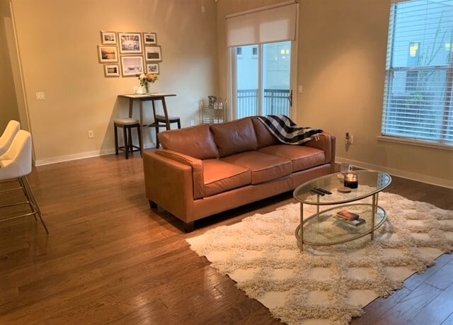 Open floor plan living space opens into dining area - 2950 McKinney Ave