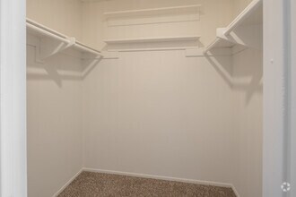 2BR, 1BA - 920SF - Primary Closet - Newport Village Apartments