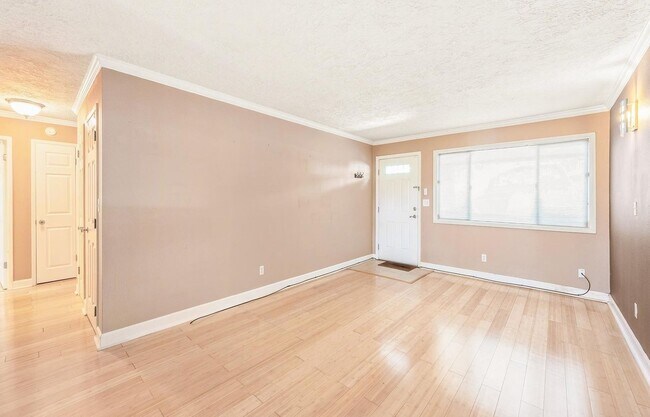 Foto del edificio - Spacious 2-Bedroom Condo with Forest Views, Private Balcony, In-Unit Laundry & Community Amenitie...