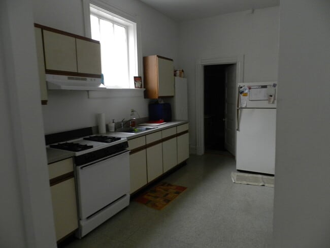 Kitchen + Newer fridge - 2324 W Grace St