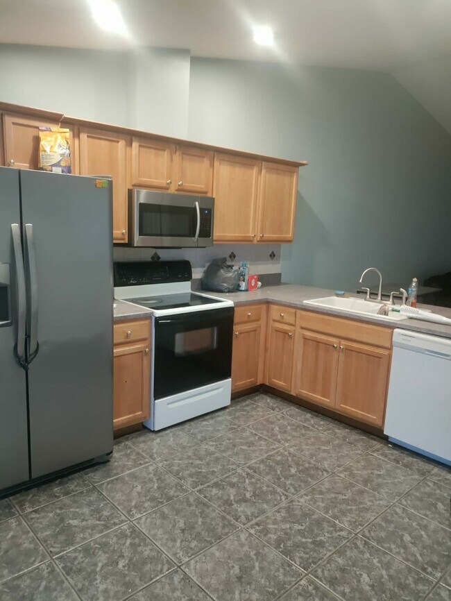 Kitchen open to dining/LR area - 3 Frank Pl