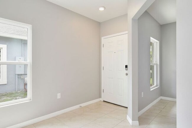 Building Photo - Move-In Ready 2BR/2BA Villa with Den + 2-Car Garage | Lake Nona Adjacent | Suncrest at St. Cloud