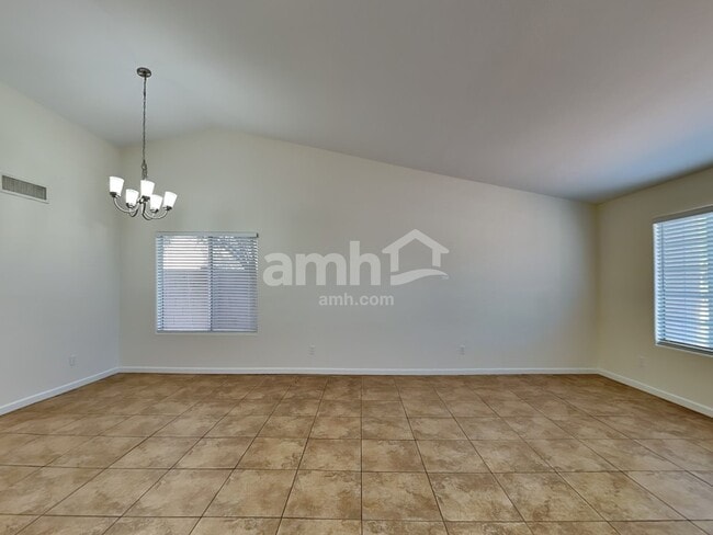 Building Photo - 8748 W Acapulco Ln