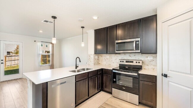 Foto del edificio - 8519 Adler Fall Ln