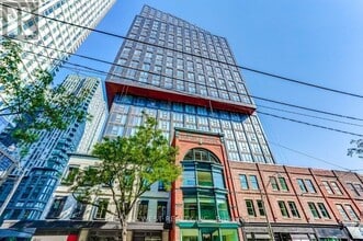 Building Photo - 100 Queen St E