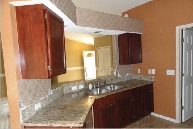 Building Photo - 3-Bedroom, 2-Bathroom single-family home brick construction