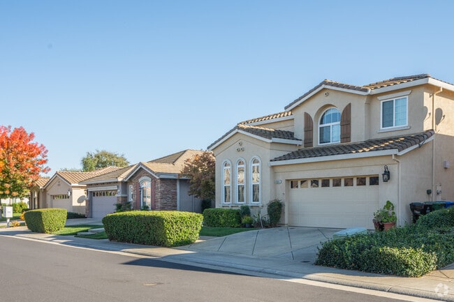 Large modern homes enjoy a quiet surrounding with a park at the end of the street.