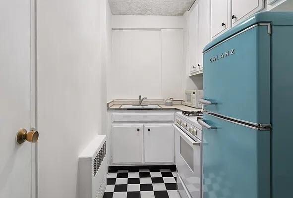 Building Photo - 77 E 12th St