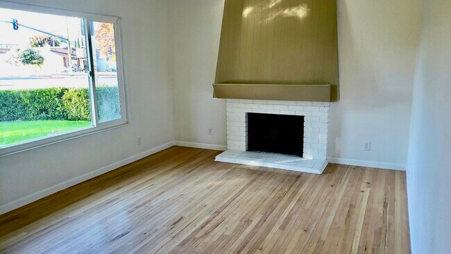 Living room with fireplace - 499 Calero Ave