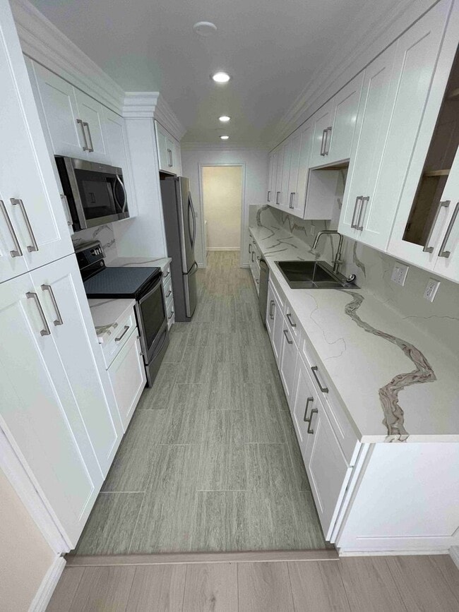 Building Photo - COMPLETELY UPDATED AND REMODELED ENCINO SP...