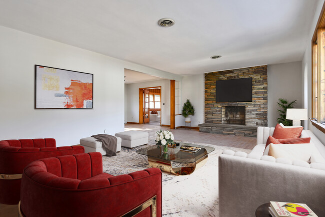 Love this large Living Area with fireplace - 664 Riverview Dr