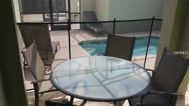 Foto del edificio - 8934 Majesty Palm Rd