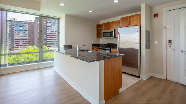 Kitchen with Stainless Steel Appliances - The West End Apartments