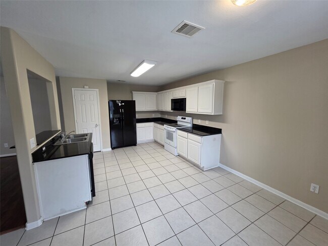 Foto del edificio - 28942 Village Creek Loop