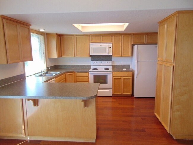 Foto del edificio - Enjoy Easy Living in Cascade Park with a Private Fenced Backyard