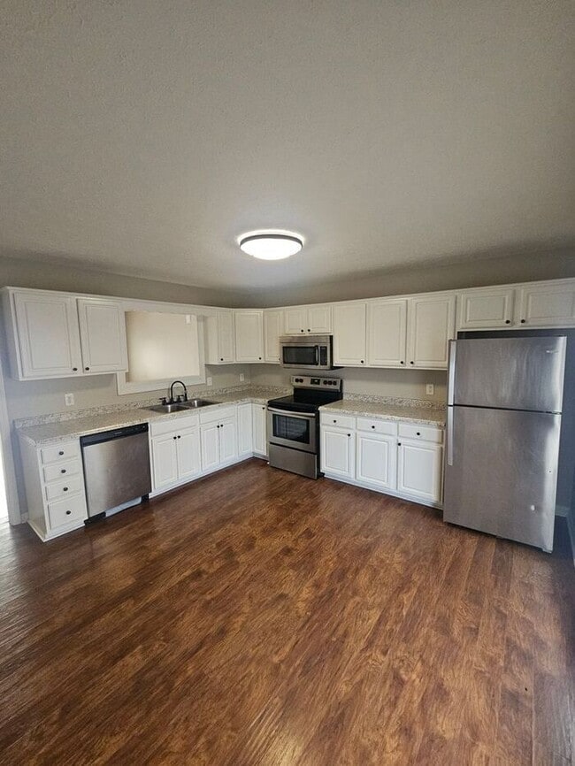 Building Photo - Discover comfort, convenience, and modern ...