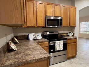 Building Photo - 4406 Windmill Palm Way