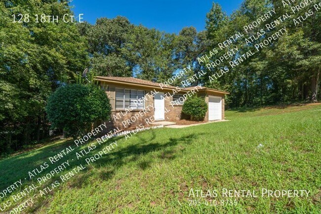 Building Photo - 128 18th Ct E