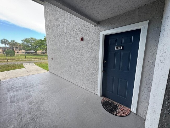 Building Photo - 10381 SW 150th Ct