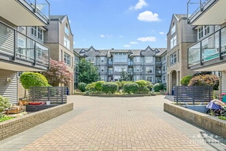 Building Photo - 20200-20256 56 Ave