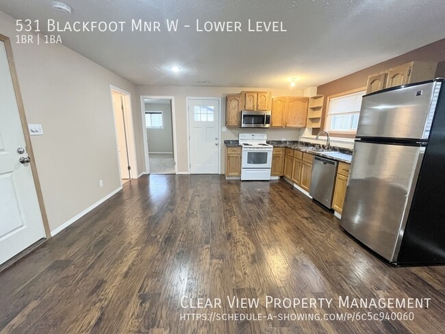 Photo du bâtiment - 1 bed, 1 bath suite with garage and utilit...