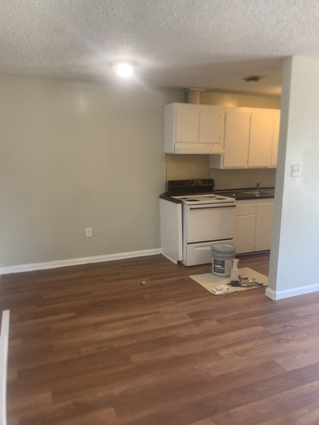 Living room headed into kitchen - 101 S Corrine St