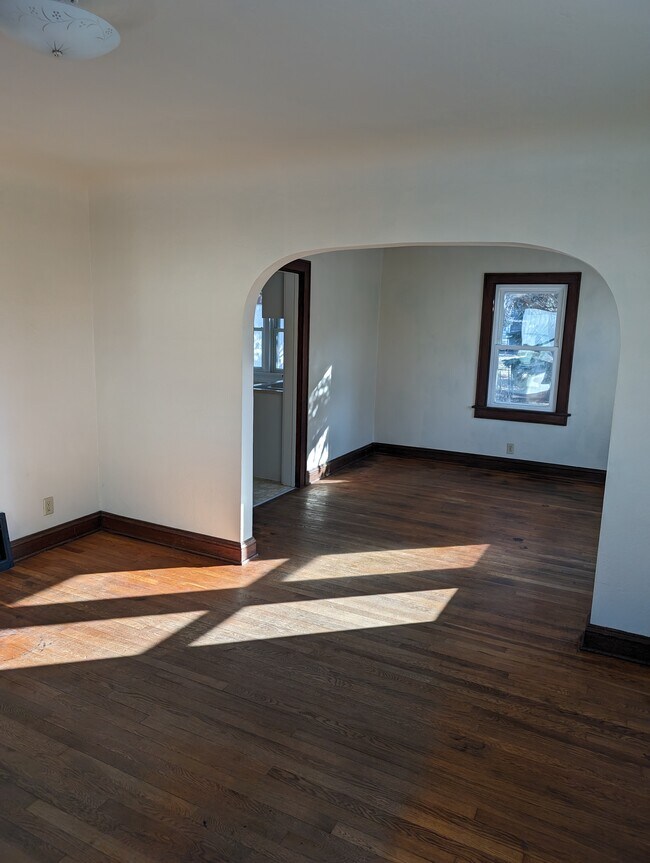Living room and dining room - 520 N Henry St