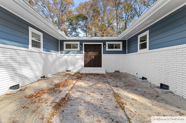 Building Photo - COMPLETELY RENOVATED WITH IN-LAW SUITE