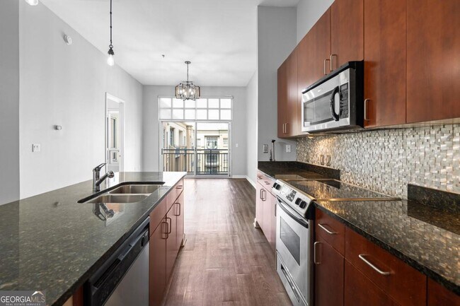 Building Photo - 711 Cosmopolitan Dr NE