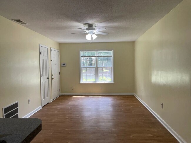 Building Photo - Charming 3BR Brick Home near Sandfly with Fully Fenced Backyard