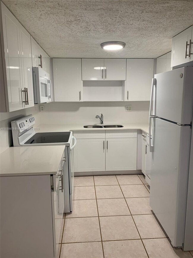 Building Photo - 11101 Royal Palm Blvd