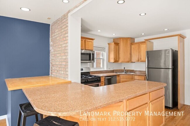 Foto del edificio - 6155 W School St