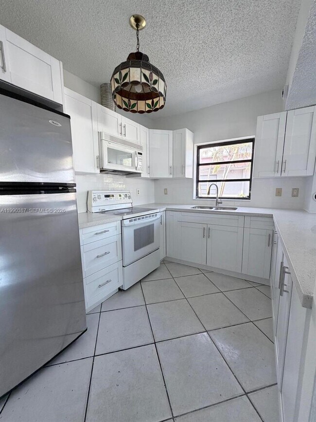 Building Photo - 450 NW 43rd Pl