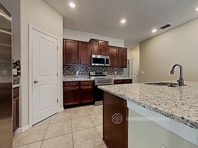 Building Photo - 10212 Strawberry Tetra Dr