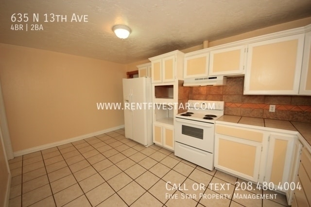 Building Photo - 635 N 13th Ave