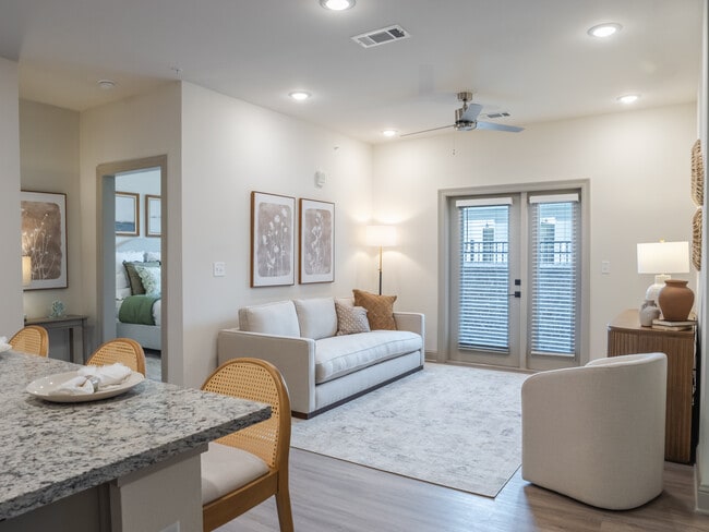 The Escambia: 3BR, 2BA- Living Room - The Flats at Ransley
