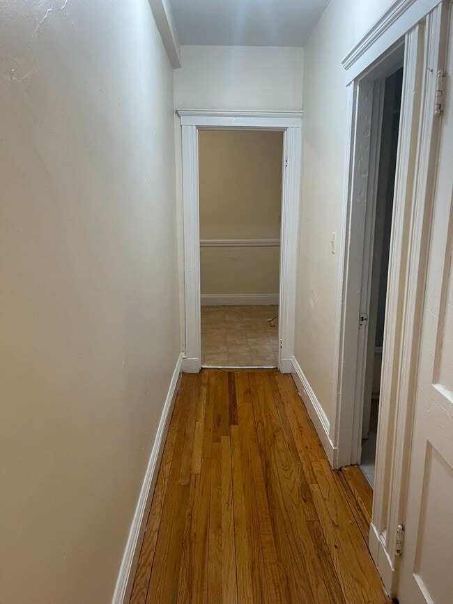 Building Photo - Renovated 1  bed , Sunny and Spacious, Utilities and laundry Inc Close to train 1 free Month