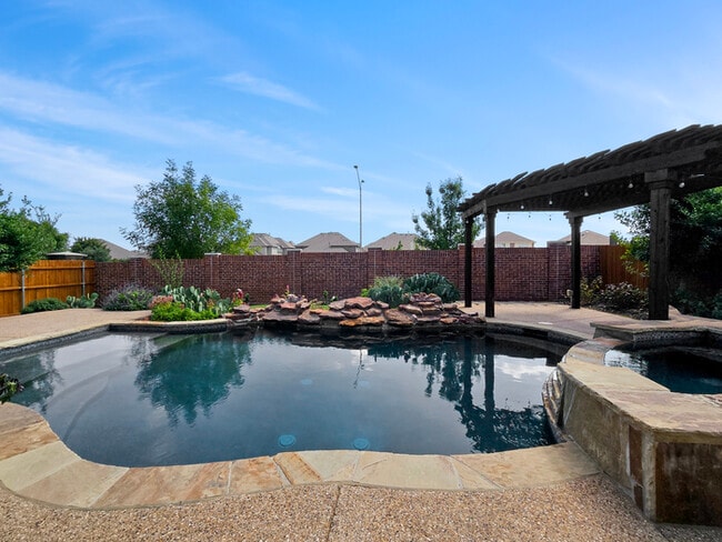 Building Photo - Immaculate 4-Bedroom Home with Luxury Upgr...