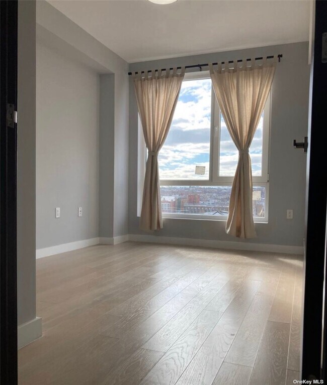 Building Photo - 70-09 45th Ave