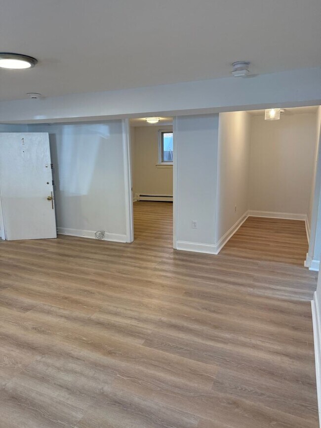 Building Photo - Bright and Spacious, Renovated Basement-Le...