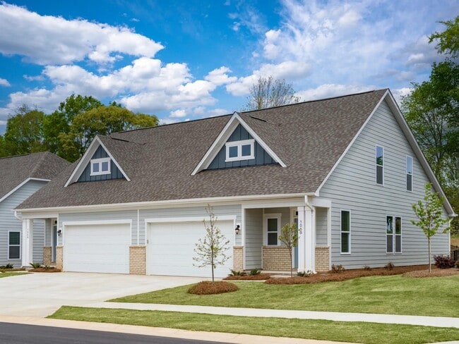 Spacious garages ready for hobbies, projects, and new beginnings. - Amavi Mooresville