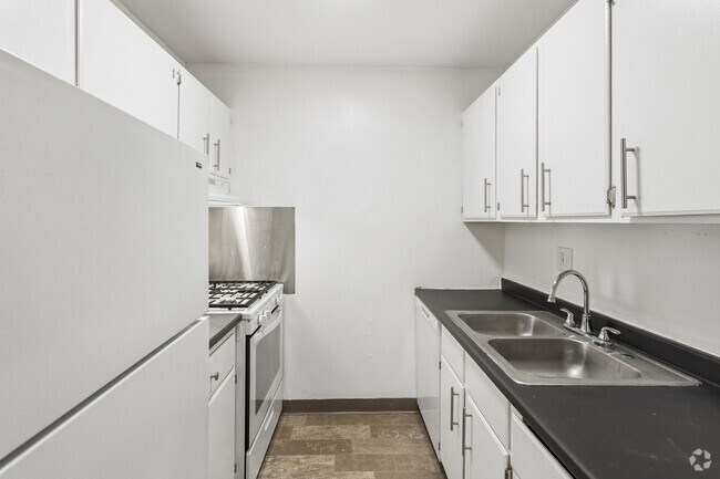 2 habitaciones, 1.5 baños - 850 pies cuadrados - Cocina - Cedar Ridge Apartments