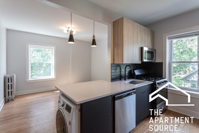 Foto del edificio - 4011 N Lowell Ave