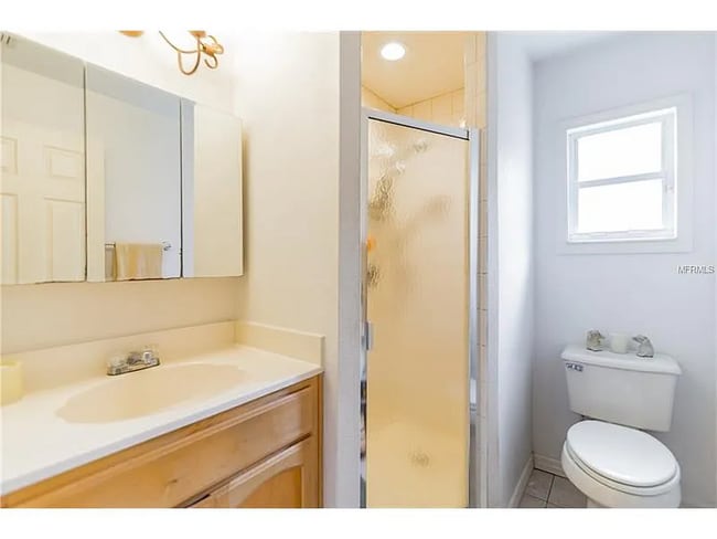 small bathroom with shower unit - 1061 Francis St