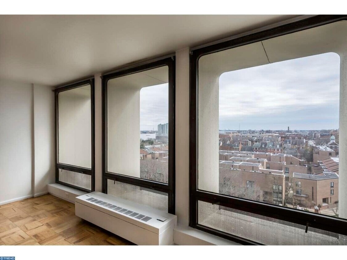 Floor to ceiling windows with shades and opening window - 220 Locust St