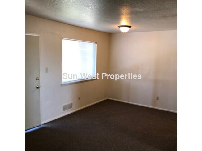 Building Photo - All utilities paid! Laundry on site!