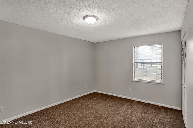 Building Photo - 10825 Key Haven Blvd