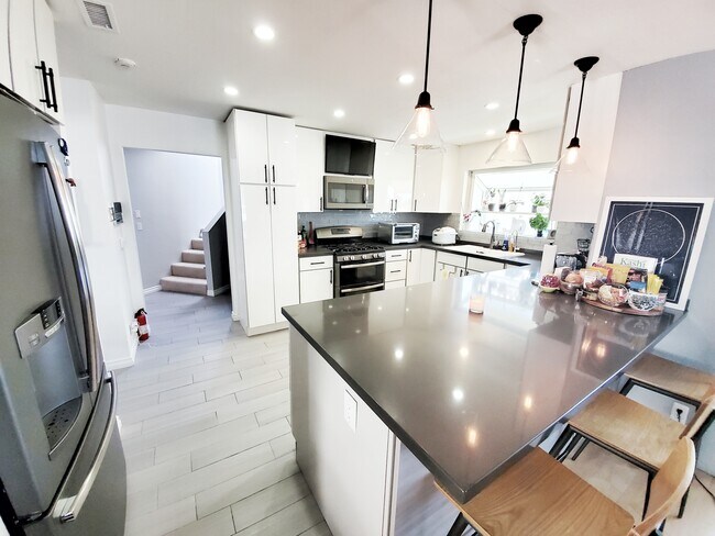 Kitchen - 2608 Gates Ave Apartment